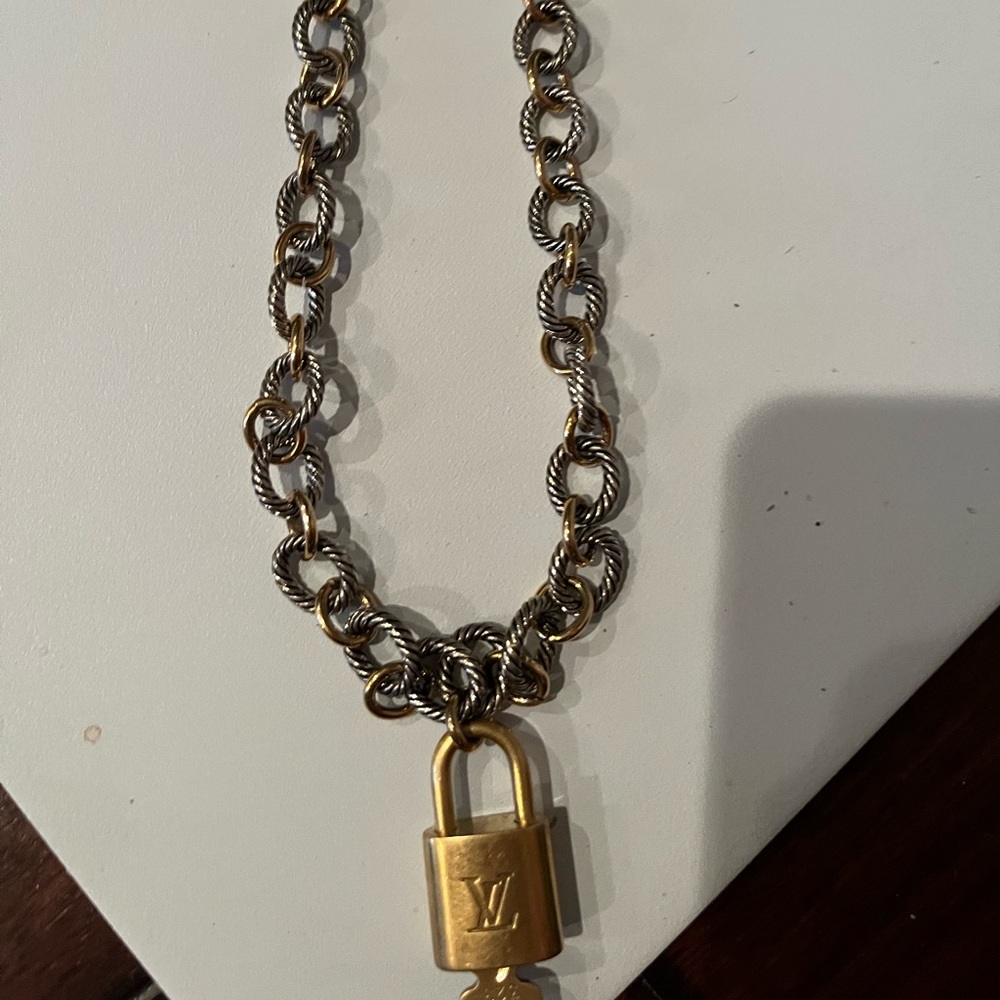 Louis Vuitton Lock and Key EUC Key Number 328 Guaranteed Authentic with chain.